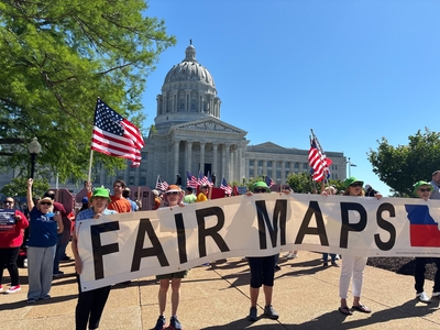 Demonstrators near the Missouri Capitol on Tuesday, May 12, 2026, protested a proposed congressional map aimed at ousting a Democratic congressman in Kansas City. The Missouri Supreme Court held arguments on legal challenges to the map. (Photo by Jonathan Shorman/States Newsroom)