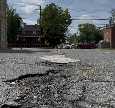 Loss of Key Bridge leads to more potholes, truck traffic in neighborhoods