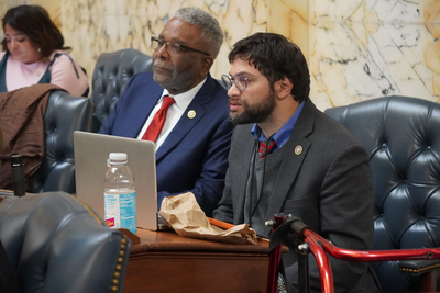 Del. Aaron Kaufman (D-Montgomery) sits in his seat on the House floor Aug. 3, 2026. (Photo by Will Hammann/Maryland Matters)