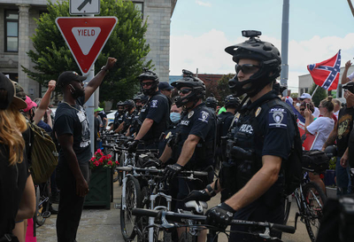 In Graham, hundreds of protesters demand removal of Confederate statue, sheriff’s resignation