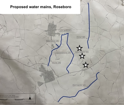 This map shows the areas in Roseboro and the unincorporated Snow Hill community that could be connected to public water. Sampson County received $4.1 million in stand funds for public water connections. The blue lines are the roads where the lines could run; the white stars represent the three landfills that make up the larger county disposal complex. (Map: Sampson County Public Works)