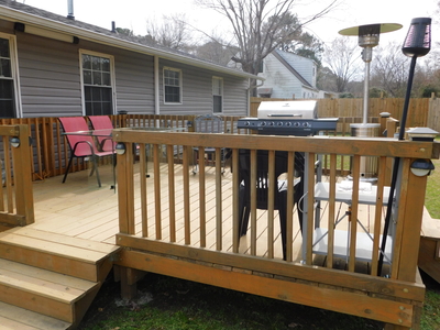 a deck on the back of a home