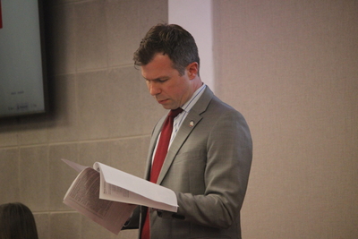 Rep. Phil Rubin reads legislation