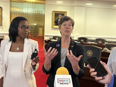 Julie Mayfield and DeAndrea Salvador speak to reporters on the Senate floor.