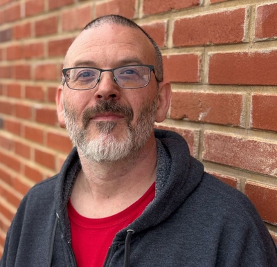 Steven Wayne Fish stands for a photo in downtown Ottawa, Kan. Fish was unable to vote in 2014 because of Kansas' proof of citizenship voter registration law. (Jonathan Shorman/Stateline)