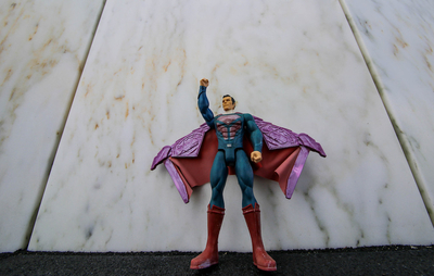 A Superman action figure left by a visitor at the base of Flight 93 passenger Louis "Joey" Nacke at the Flight 93 National Memorial in Stonycreek Township, Pennsylvania, on Aug. 26, 2026. Nacke had a Superman tattoo, and is believed to have been one of the passengers who attempted to retake the hijacked jetliner. (Photo by Tim Lambert/Pennsylvania Capital-Star)