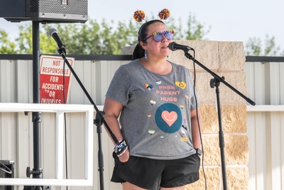 PFLAG President, Peggy Reeves, discusses the intense need to help trans children in Texas during the Pride Festival hosted by Basin Pride at The Vine in Odessa, Texas.