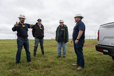 From left, Travis Baer, District Director of districts 1&amp; 2 at the Railroad Commission, Plugging Contractor &amp; Owner of Bulldog Oil Well Services Randy Niedorf, David Ondrasek, Plugger-Inspector at the Railroad Commission of Texas, and Railroad Commission State Managed Plugger Nicholas Harrel stand on the site of an orphan well in a field in Luling, Texas on March 27, 2025.
