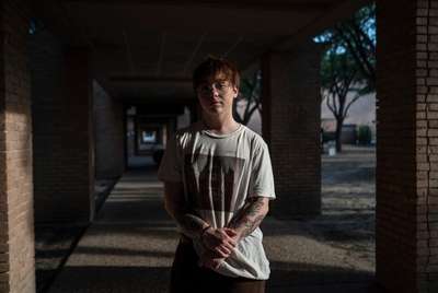 Ryan McBride, 23, a teaching assistant and student at the University of Texas Rio Grande Valley, UTRGV, majoring in English linguistics, poses for a photo at the university in Edinburg on May 16, 2025.