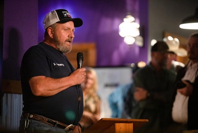 Jim Emery, a volunteer at the local fire department, expresses his concern of electrical fires that might arise as a result of solar project expansions, at a community meeting at Penelope's Coffee in Mt. Vernon, on April 8, 2023. "Think about more than 'right now', and the dollars that are going to come," said Emery, "Think about your kids and the generations that are going to come after us."