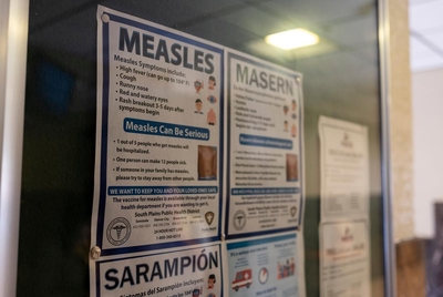 Signs inform people of measles prevention and testing at the Gaines County Court House in Seminole on Sunday on April 6, 2025.