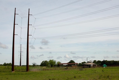 Transmission lines run to the Thorn Tree Switch station, over farm and ranch land in Mt. Vernon on April 10, 2023.