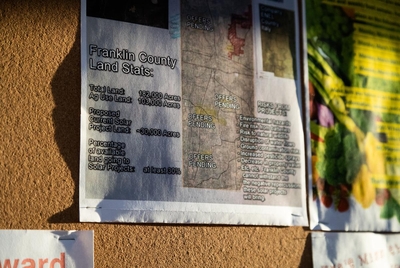 A homemade info sheet with a map of where the various solar projects are built nearby Franklin county at a community meeting at Penelope's Coffee in Mt. Vernon, on April 8, 2023.