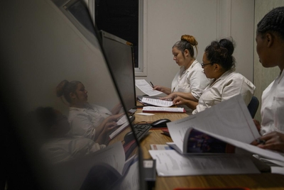Women who are incarcerated participate in a Lee College course that focuses on reentry at Lucile Plane State Jail in Dayton, Texas, US, on Monday October 28, 2024.