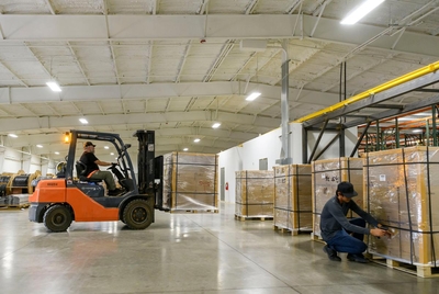 Helios employees unload ASIC mining servers, the computers used to mine Bitcoin, near Afton, on Sept. 15, 2022.