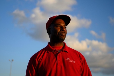Calvin Green, a reentry specialist who used to be incarcerated, poses for a portrait before teaching a Lee College course that focuses on reentry for women who are incarcerated at Lucile Plane State Jail in Dayton, Texas, US, on Monday October 28, 2024.