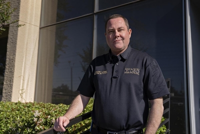 Dr. Thomas D. McNeese, who is in charge of the behavioral health department in the Harris County Sheriff's Office and is focused on law enforcement mental health, poses for a portrait on March 7, 2025, in Houston, Texas.