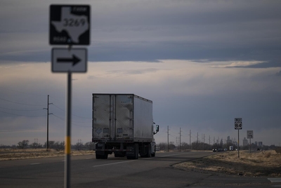 A truck drives down Highway 84 towards Muleshoe. The town is closer to New Mexico than it is to Lubbock, the nearest city.