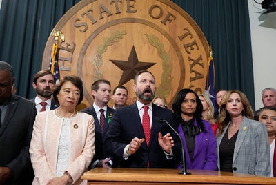 House Speaker Dustin Burrows leads a Republican press conference during the Texas House session on August 4, 2025 where only 90 members registered failing to reach a quorum with the departure of dozens of Democrats out of state.