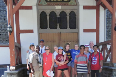 Clarence Thomas and his wife, Ginni, front left, with Harlan Crow, back right, and others in Flores, Indonesia, in July 2019.
