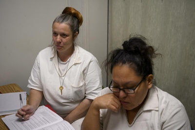 Women who are incarcerated participate in a Lee College course that focuses on reentry at Lucile Plane State Jail in Dayton, Texas, US, on Monday October 28, 2024.