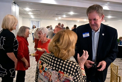 Texas House District 71 Rep. Stan Lambert speaks with one of the attendees at monthly meeting of the Texas Retired Teachers Association Region 14 chapter at the Abilene Country Club Feb. Thursday 8, 2024.