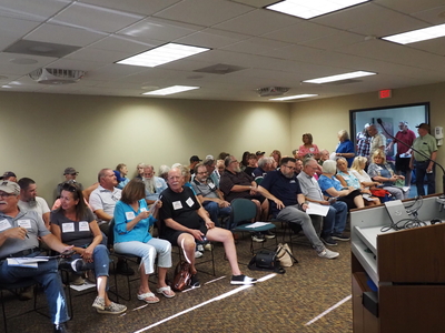 Angry crowd confronts Oklahoma water regulators over dams