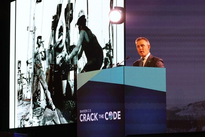Burgum touts AI data centers, calls Iran war ‘gift to the world’ in speech to oil industry