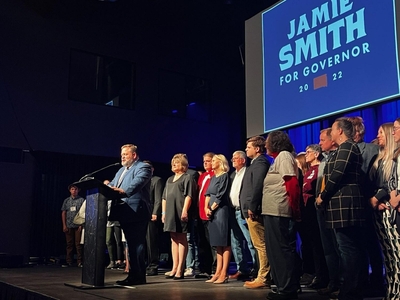 Democrat Jamie Smith speaks to assembled supporters at The District in Sioux Falls after conceding his loss to Kristi Noem in the South Dakota gubernatorial election.
