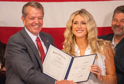 Pillen signs law defining male, female for Nebraska K-12 and college sports