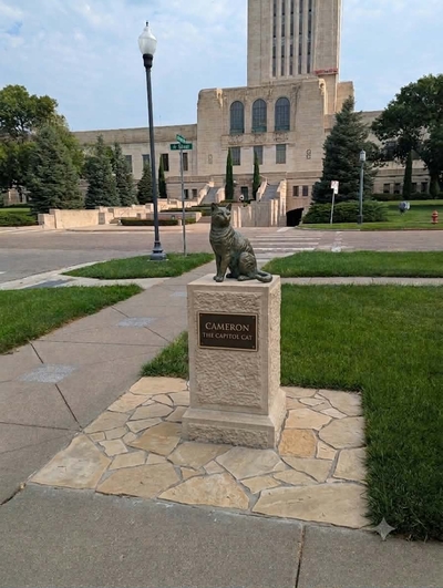 ‘So freaking cute’: Supporters pitch Cameron the Capitol Cat statue outside Nebraska State Capitol