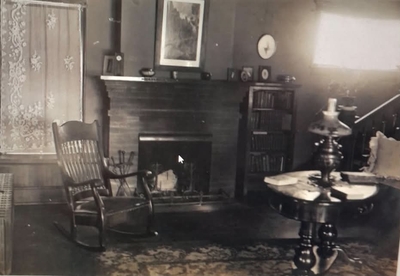 Dr. Susan La Flesche Picotte's home hosted patients, tribal members seeking help and several social and political gatherings. A Scottish inscription above the fireplace reads "East West - Hame's the best." (courtesy Nebraska State Historical Society)