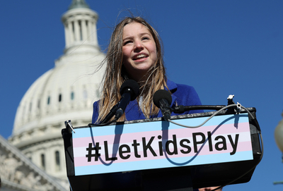 Rebekah Bruesehoff, a transgender student athlete, speaks at a press conference on LGBTQI+ rights, at the U.S. Capitol on March 8, 2023.