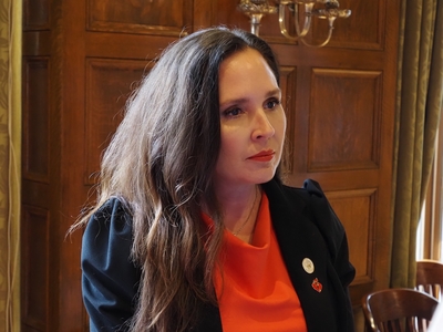 Rep. Ashley Hudson, D-Little Rock, talks with reporters about legislation intended to help mothers and infants after a press conference in the Arkansas Capitol on Feb. 6, 2025.