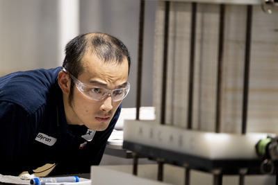EnergyX Electrodialysis Engineer Byron Tseng watches over the membrane stack during the bipolar electrodialysis process of the direct lithium extract process.