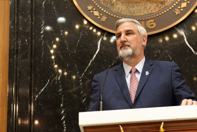 Holcomb signs transgender medical care ban, ACLU files suit