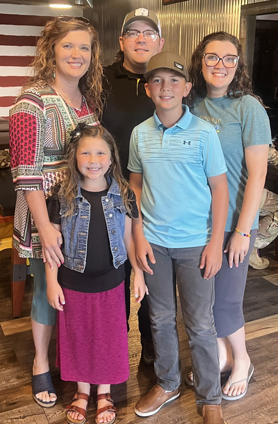 A picture of Laura Voyles with her family.