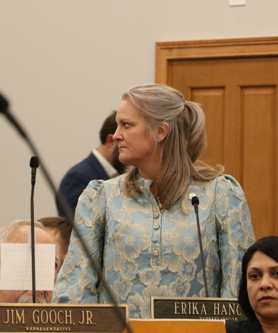 Hancock stands on the floor.
