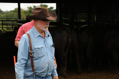 Greg Cole wears a cowboy hat.