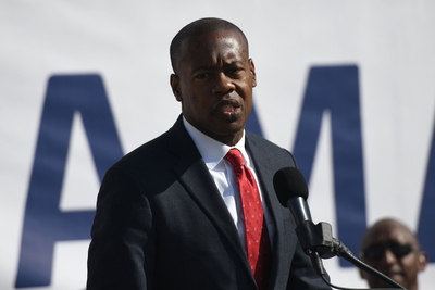 A man speaking into a microphone
