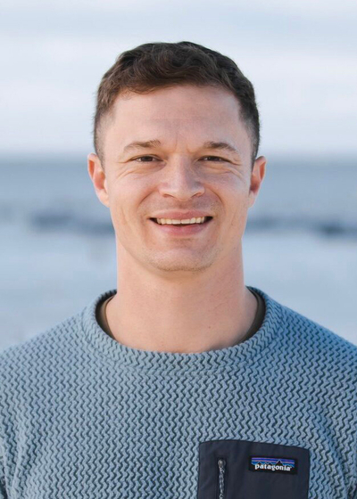 A man in a light blue shirt