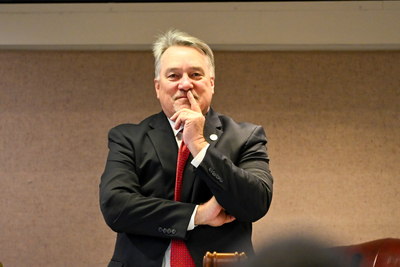 A man in a suit.