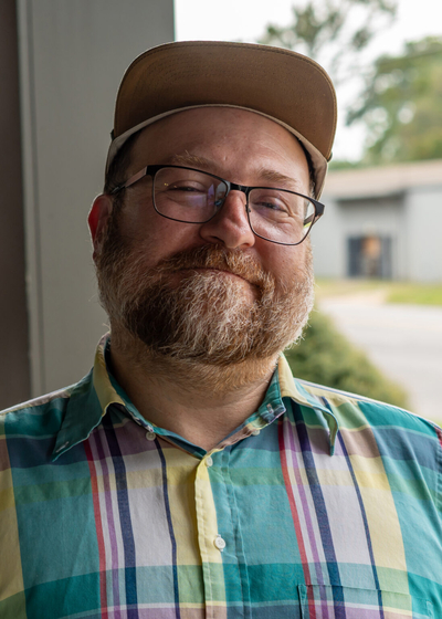 A man in a button up shirt