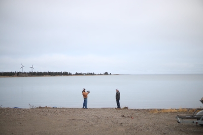 Hill tapes a video in Kokhanok. (Nathaniel Herz/Anchorage Press)