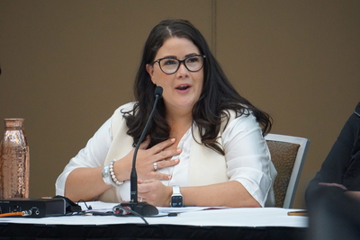 Kluane Adamek, Yukon regional chief of the Assembly of First Nations, speaks on June 14 about the loss of Yukon River salmon and effects on Indigenous people on the Canadian side of the border. Adamek was a panelist in a session at the National Congress of American Indians midyear conference in Anchorage. (Photo by Yereth Rosen/Alaska Beacon)