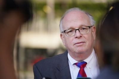 Federal Investigator Michael Wheat speaks to media outside US District Court.