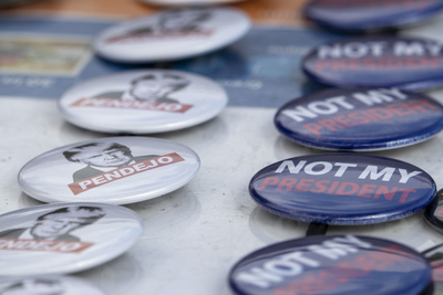 Anti-Trump buttons displayed at a protest on July 17, 2025, objecting to various Trump administration actions. (Photo by Jerod MacDonald-Evoy/Arizona Mirror)
