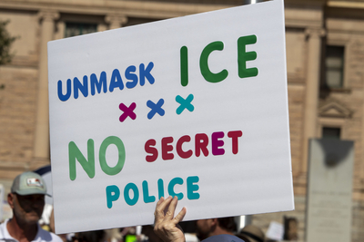 A sign at the Good Trouble protest on July 17, 2025, objecting to various Trump administration actions. (Photo by Jerod MacDonald-Evoy/Arizona Mirror)