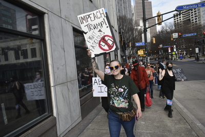 Protesters at Georgia Capitol decry Trump policies ranging from deportation to trans restrictions