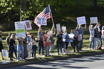 Protesters arrested, shocked with Tasers at U.S. Rep. Marjorie Taylor Greene’s town hall